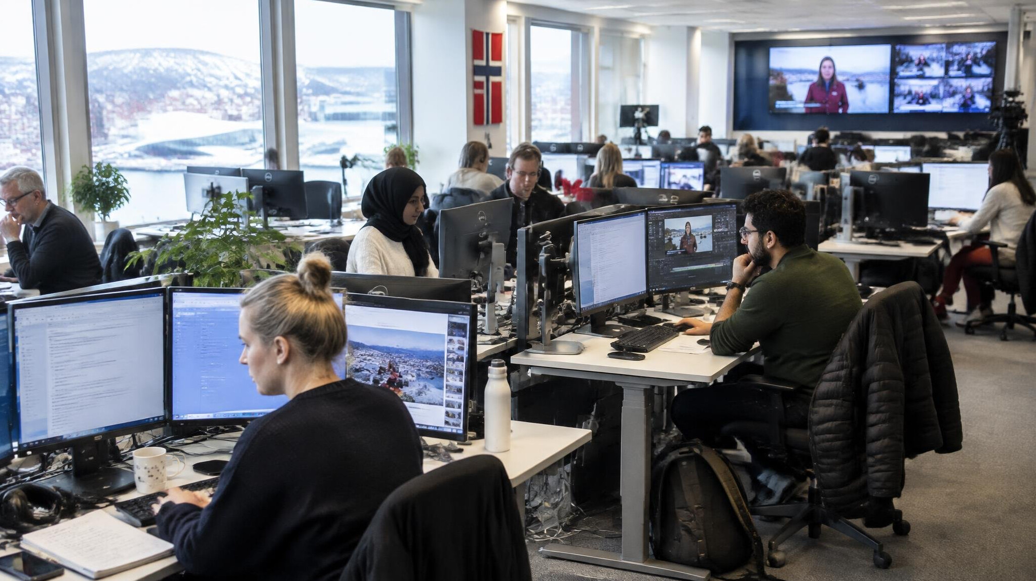 Wide view of a modern newsroom office